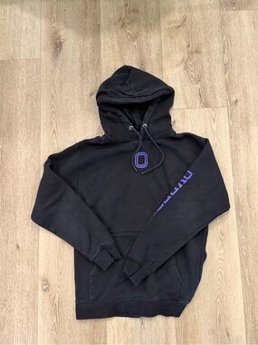 Black Hoodie with Purple 'O' Detail